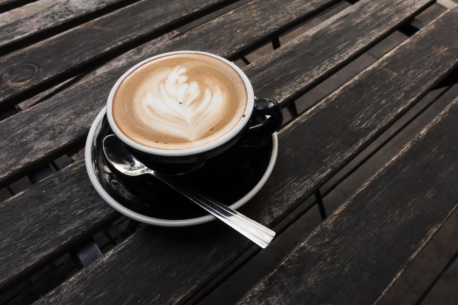 Hot Latte on Old Wood Table photo
