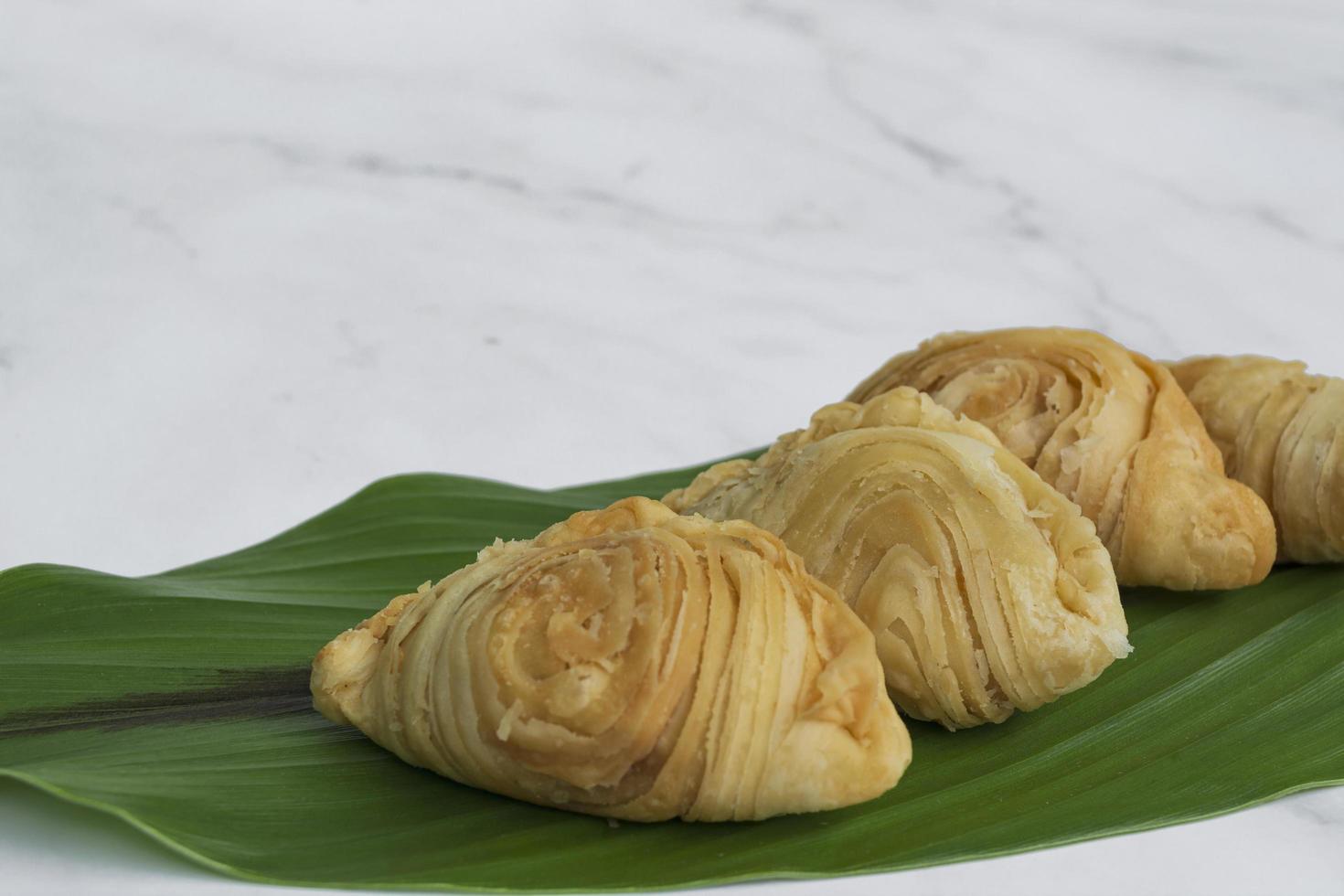 Malaysia popular and traditional snack curry puff filled with potato fillings. photo