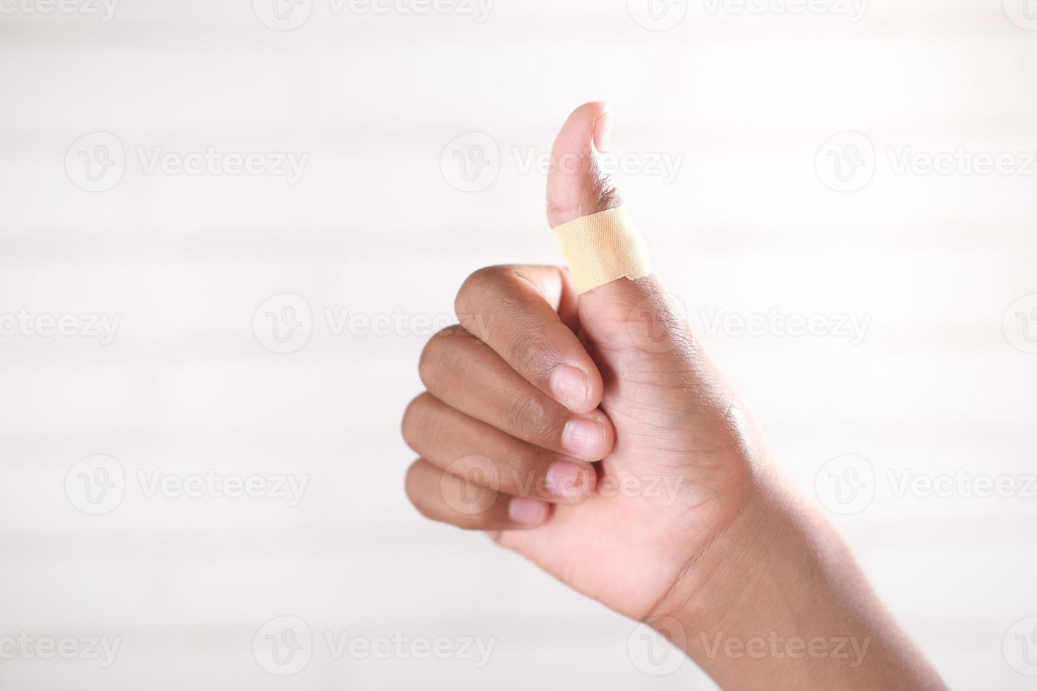 person hands with gauze bandage wrapped around . photo