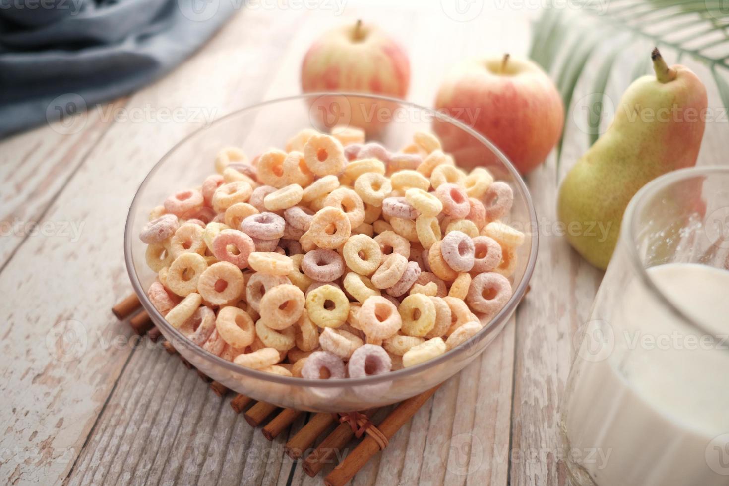 close up of colorful cereal corn flakes in a bowl photo