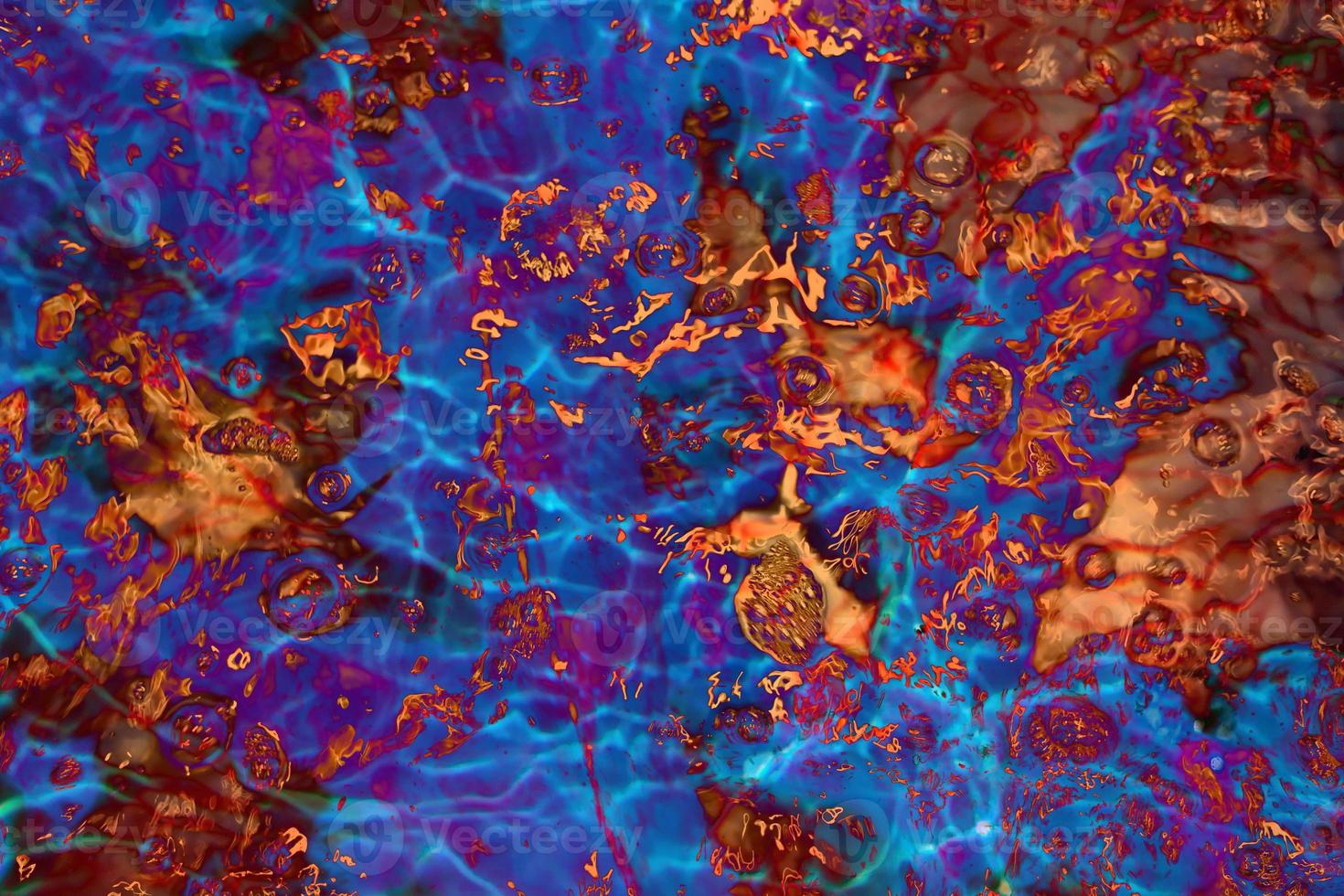 Defocus blurred transparent colorful water splash. Clear calm water surface texture with splashes and bubbles. Trendy abstract nature background. Water waves in sunlight. photo