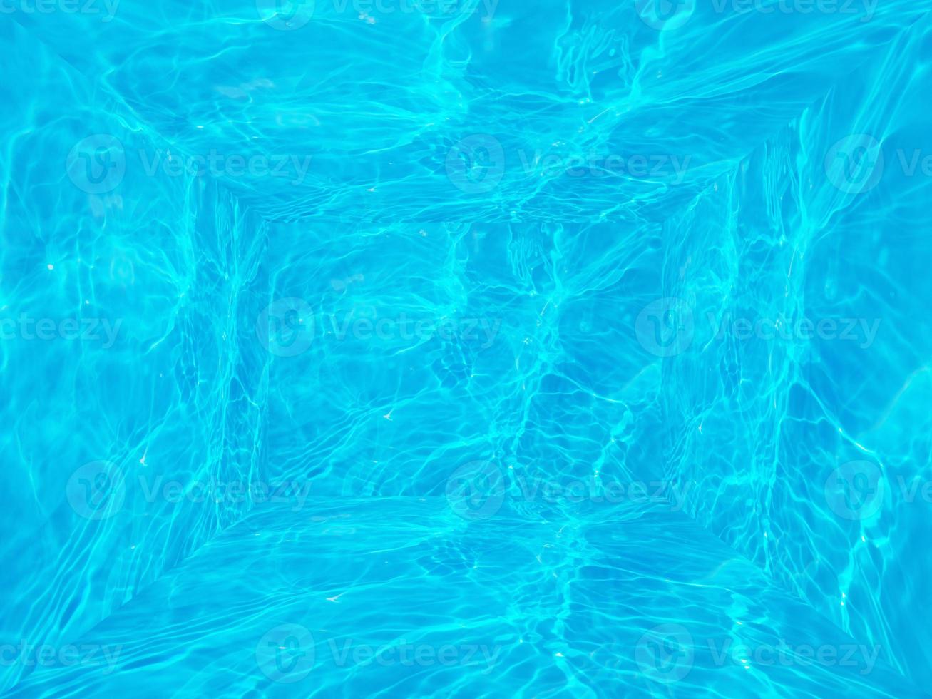 Defocus blurred transparent blue color room. Clear calm water surface texture with splashes and bubbles. Trendy abstract nature background. Water waves in sunlight. Bluewater room background. photo