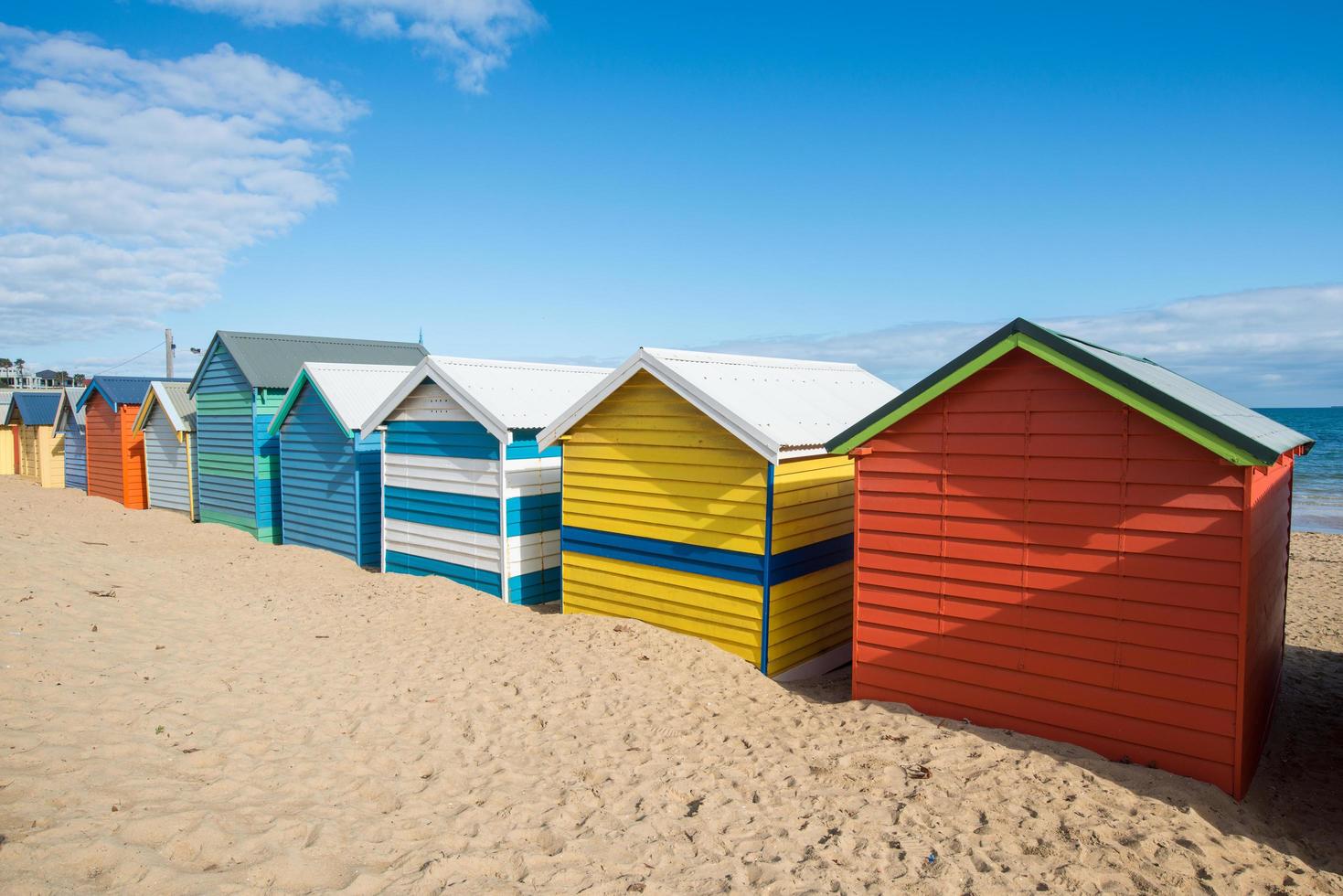 Rows of Bathing boxes at Brighton beach an iconic landmark place of Melbourne, Victoria state of Australia. photo