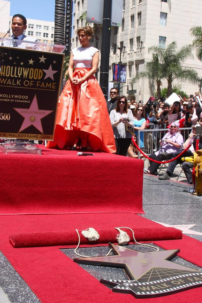 LOS ANGELES, JUN 20 - Benny Medina, Jennifer Lopez at the Hollywood Walk of Fame star ceremony for Jennifer Lopez at the W Hollywood Hotel on June 20, 2013 in Los Angeles, CA photo