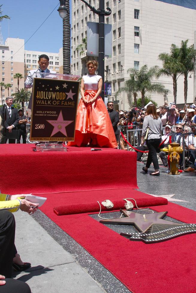 LOS ANGELES, JUN 20 - Benny Medina, Jennifer Lopez at the Hollywood Walk of Fame star ceremony for Jennifer Lopez at the W Hollywood Hotel on June 20, 2013 in Los Angeles, CA photo