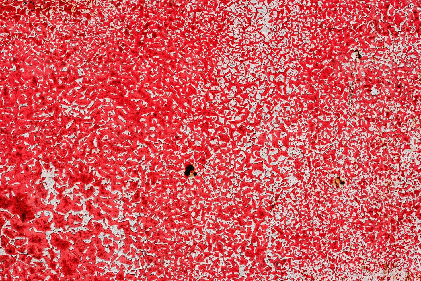 Metal texture with scratches and cracks which can be used as a background photo