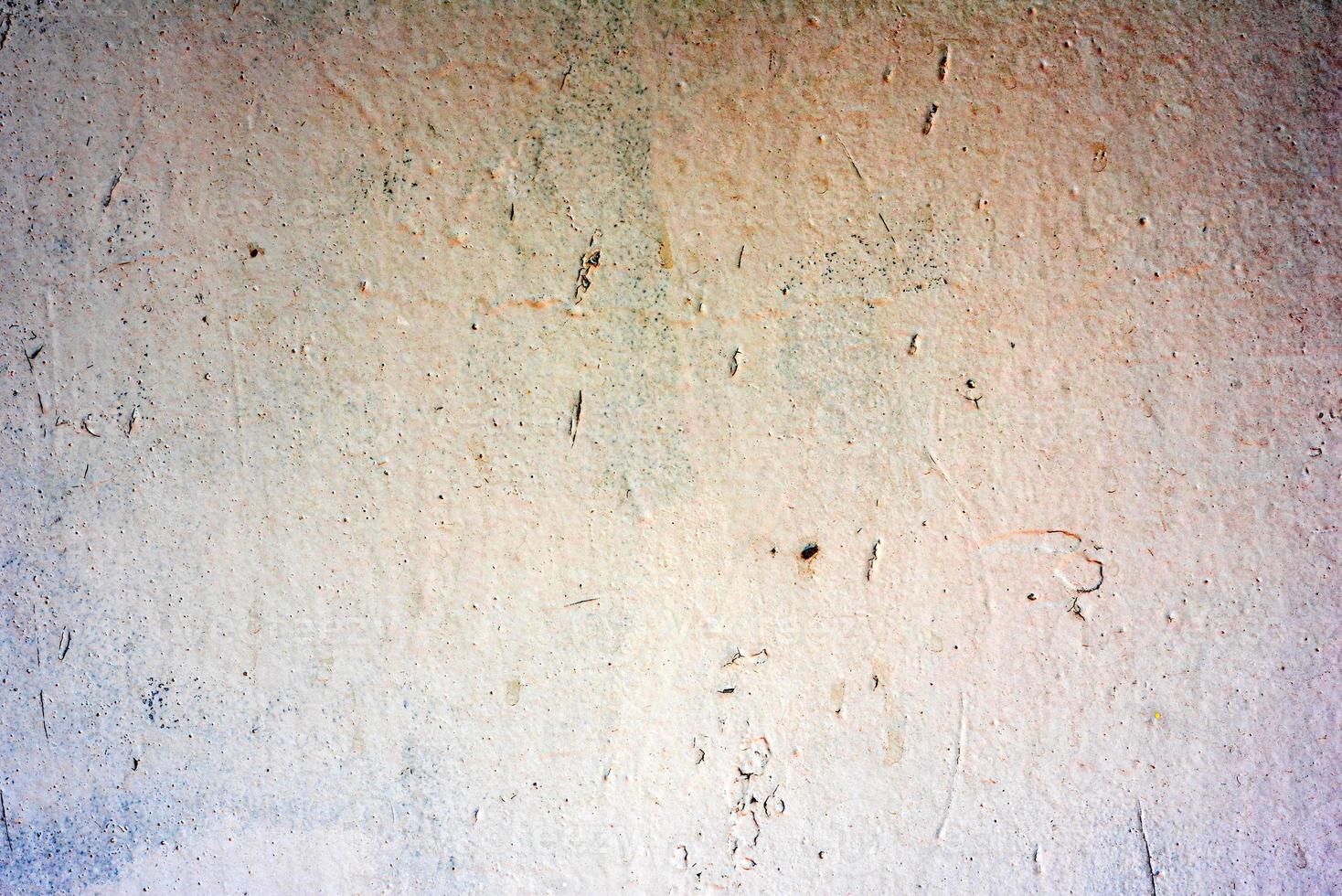 Metal texture with scratches and cracks which can be used as a background photo