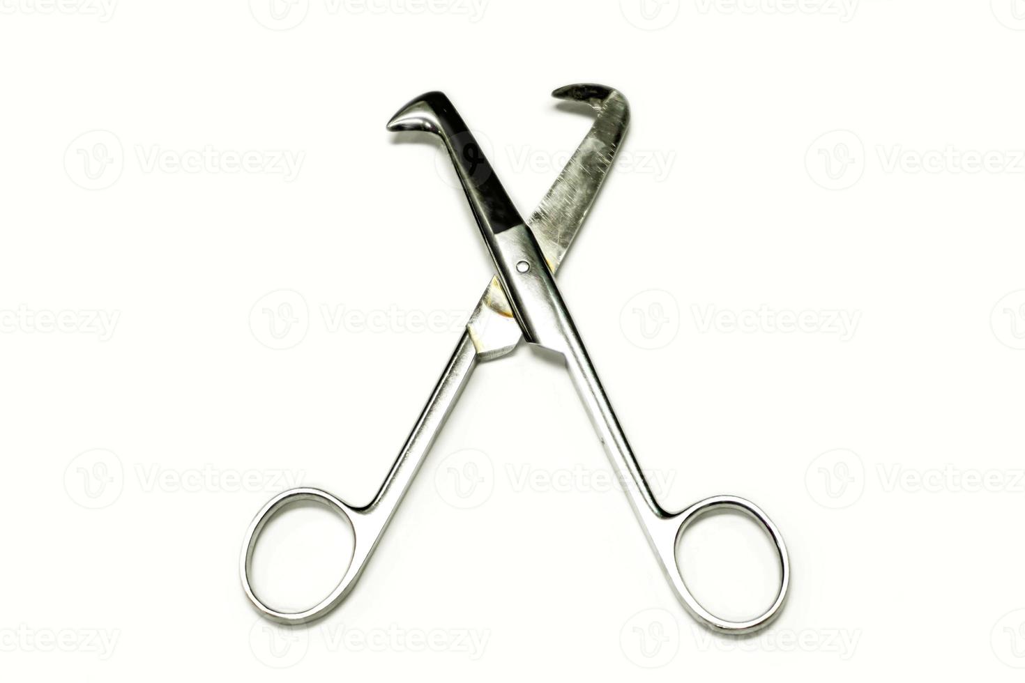 Top view of Medical umbilical cord scissor for cut intestines and veins damaged or torn isolate on white background. photo