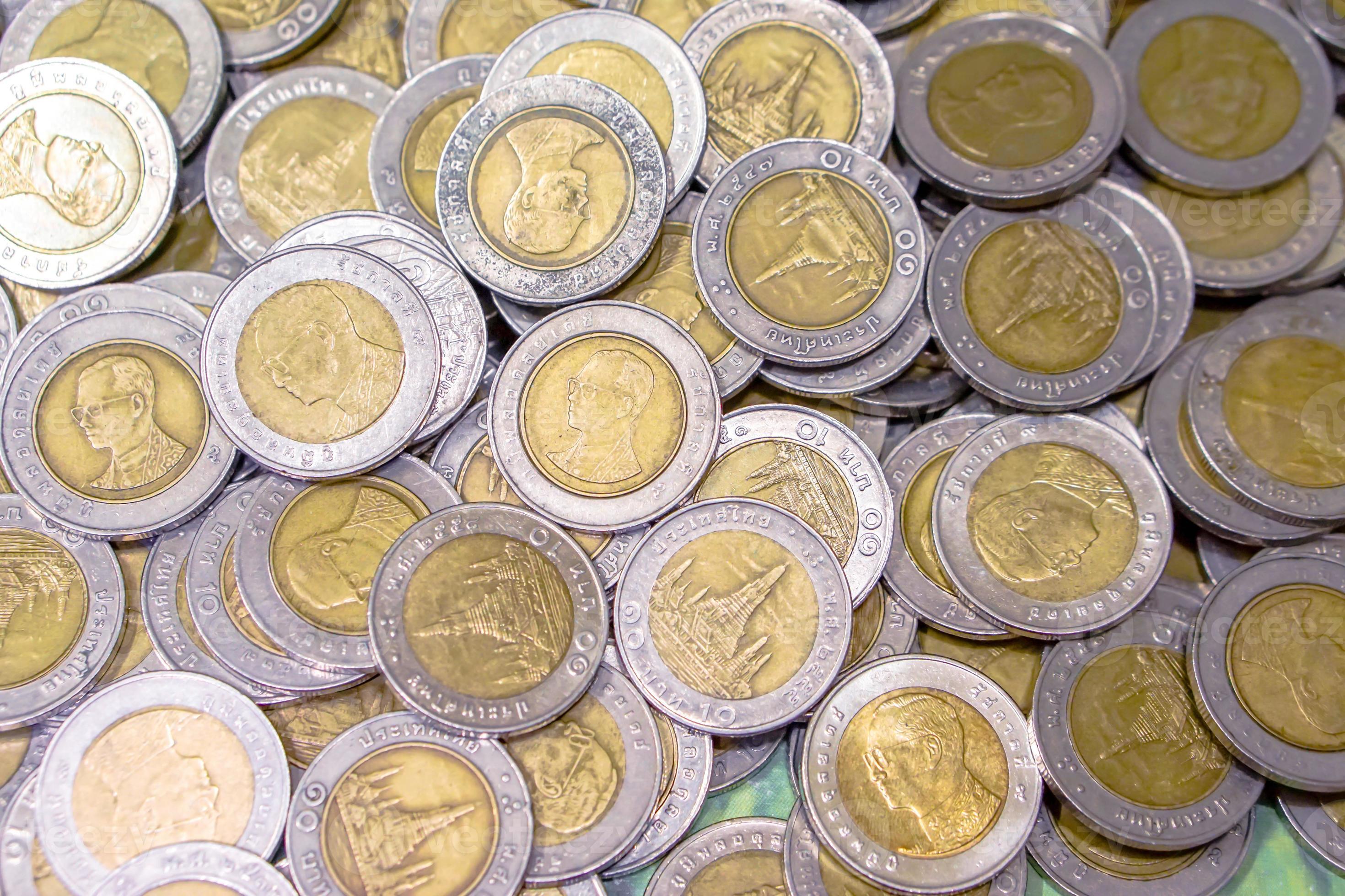 Top view of 10 baths Thai currency coins background and wallpaper