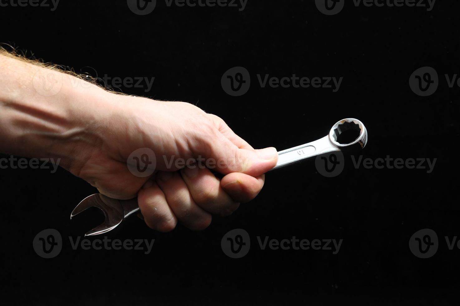 Wrench in hand photo