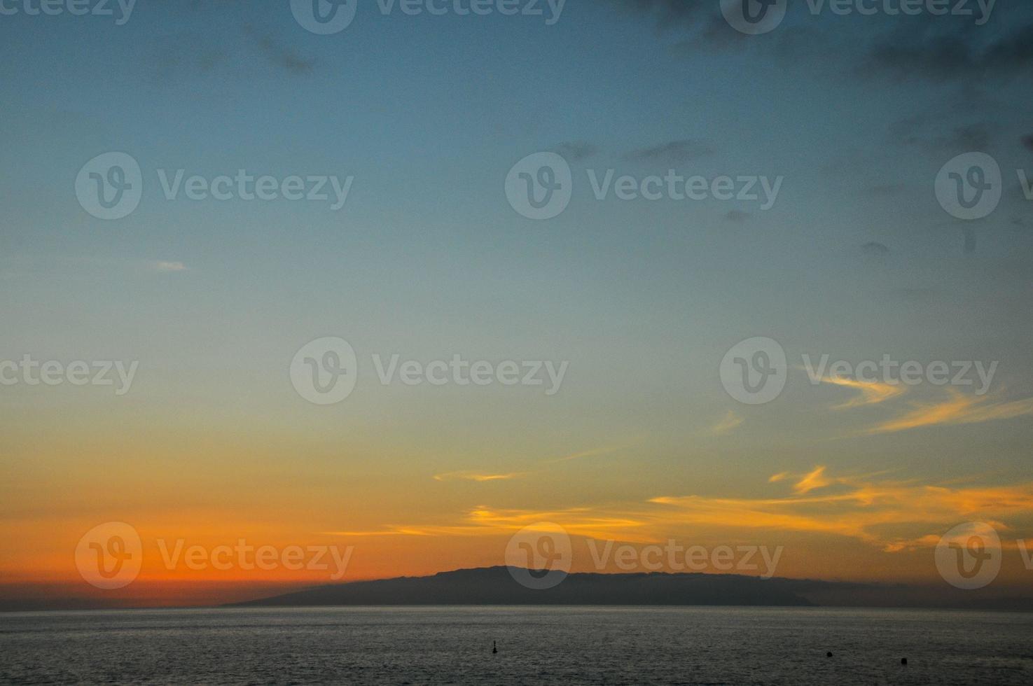 Tropical Sunset over the ocean photo