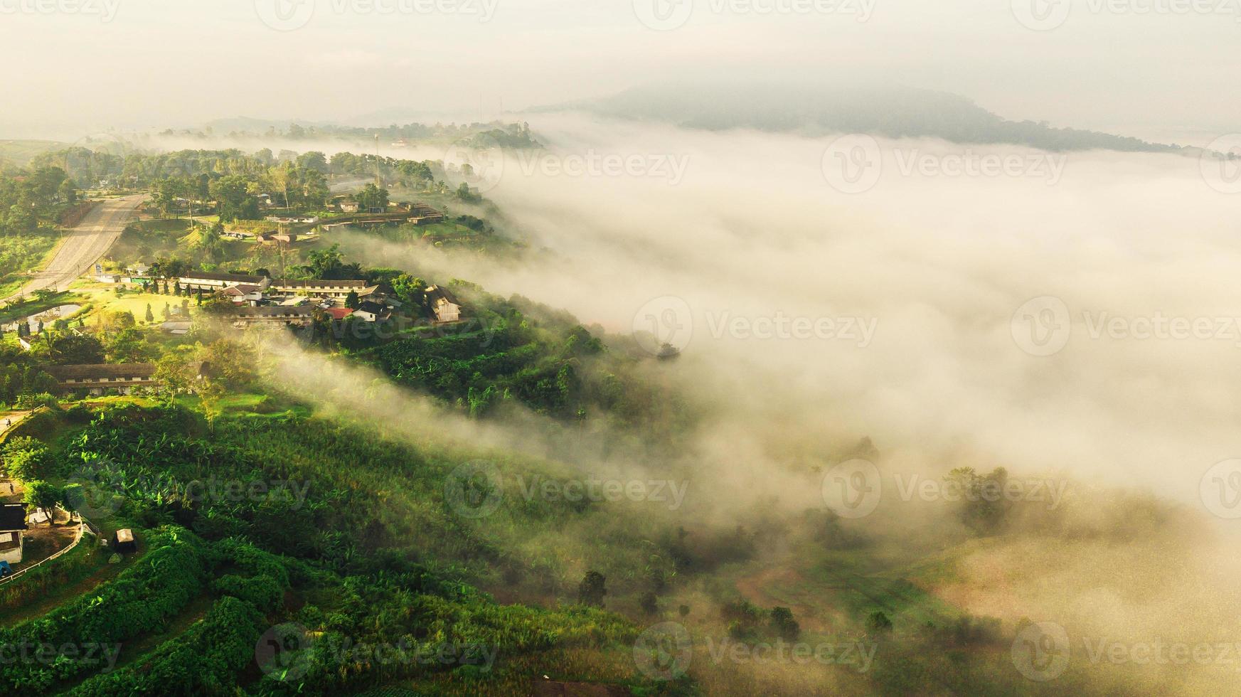 Mountains and fog in thailand photo