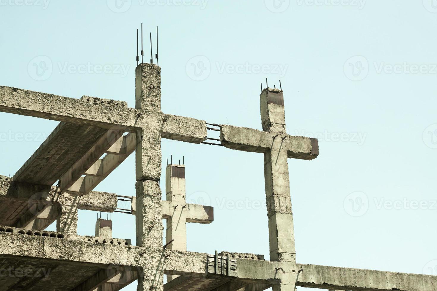 Unfinished and abandoned concrete building. Abandoned building construction. photo