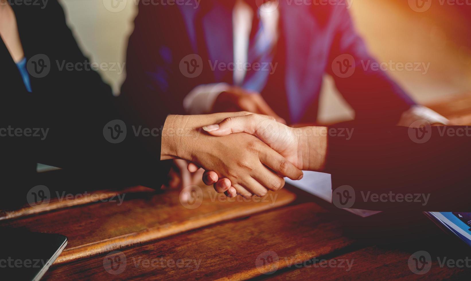 business people shaking hands Show cooperation at the end of the meeting business communication business partners Success in business and leadership communication concept photo