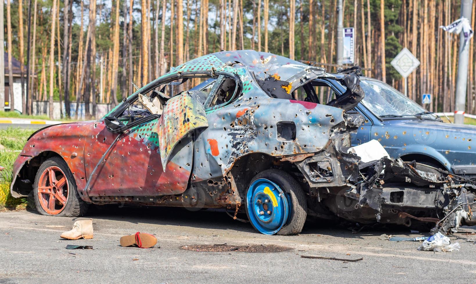 Traffic accident on the street, damaged car after a collision in the city. Accident due to speeding and alcohol intoxication. Transport background. The concept of road safety and insurance. photo