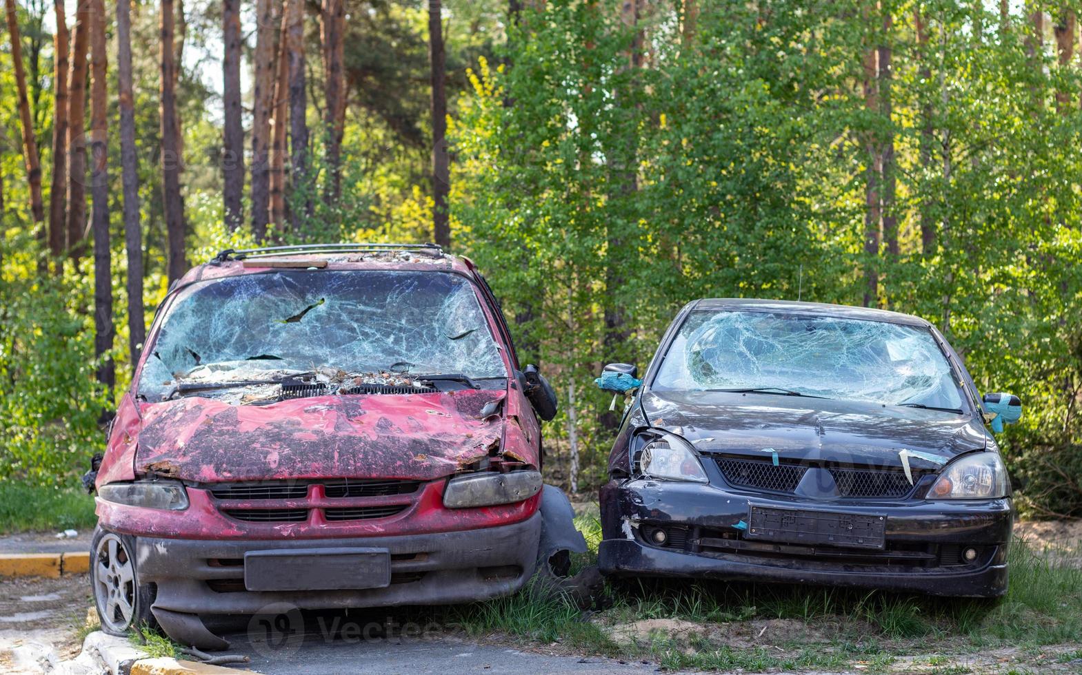 Many broken cars after a traffic accident in the parking lot of a