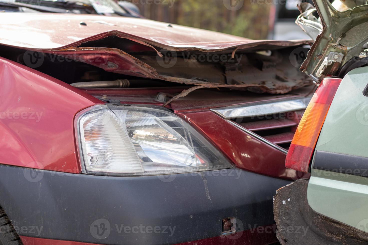 Traffic accident on the street, damaged car after a collision in the city. Accident due to speeding and alcohol intoxication. Transport background. The concept of road safety and insurance. photo