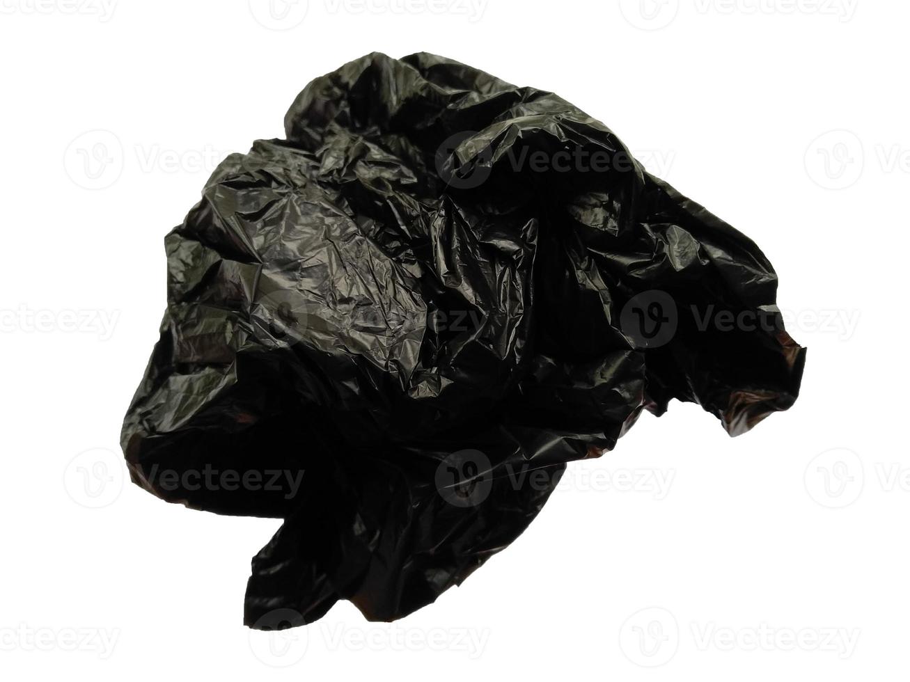 Black plastic bag isolated on white background photo