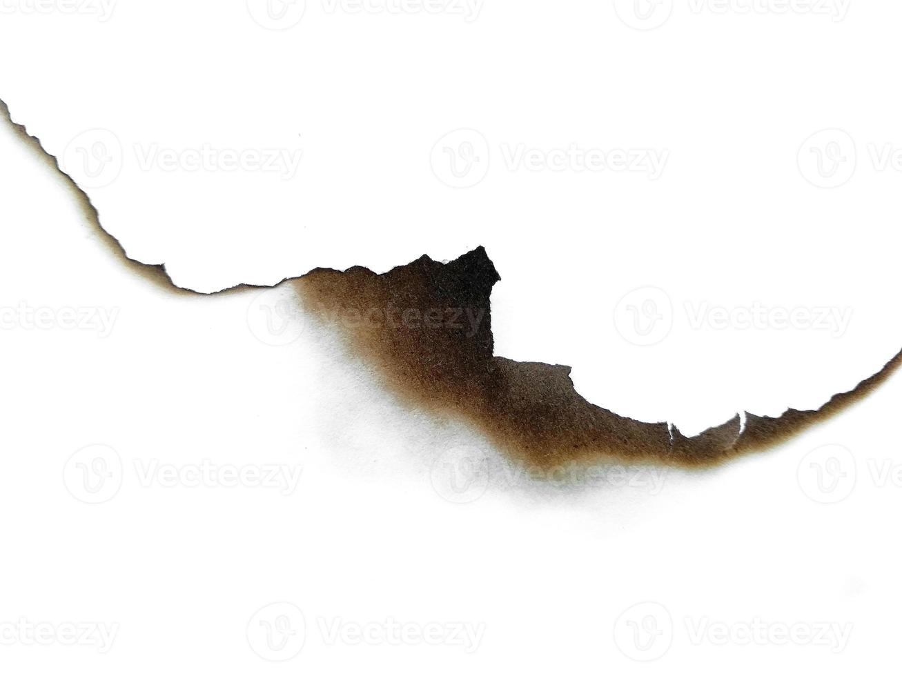 Paper burns on white backgrounds photo