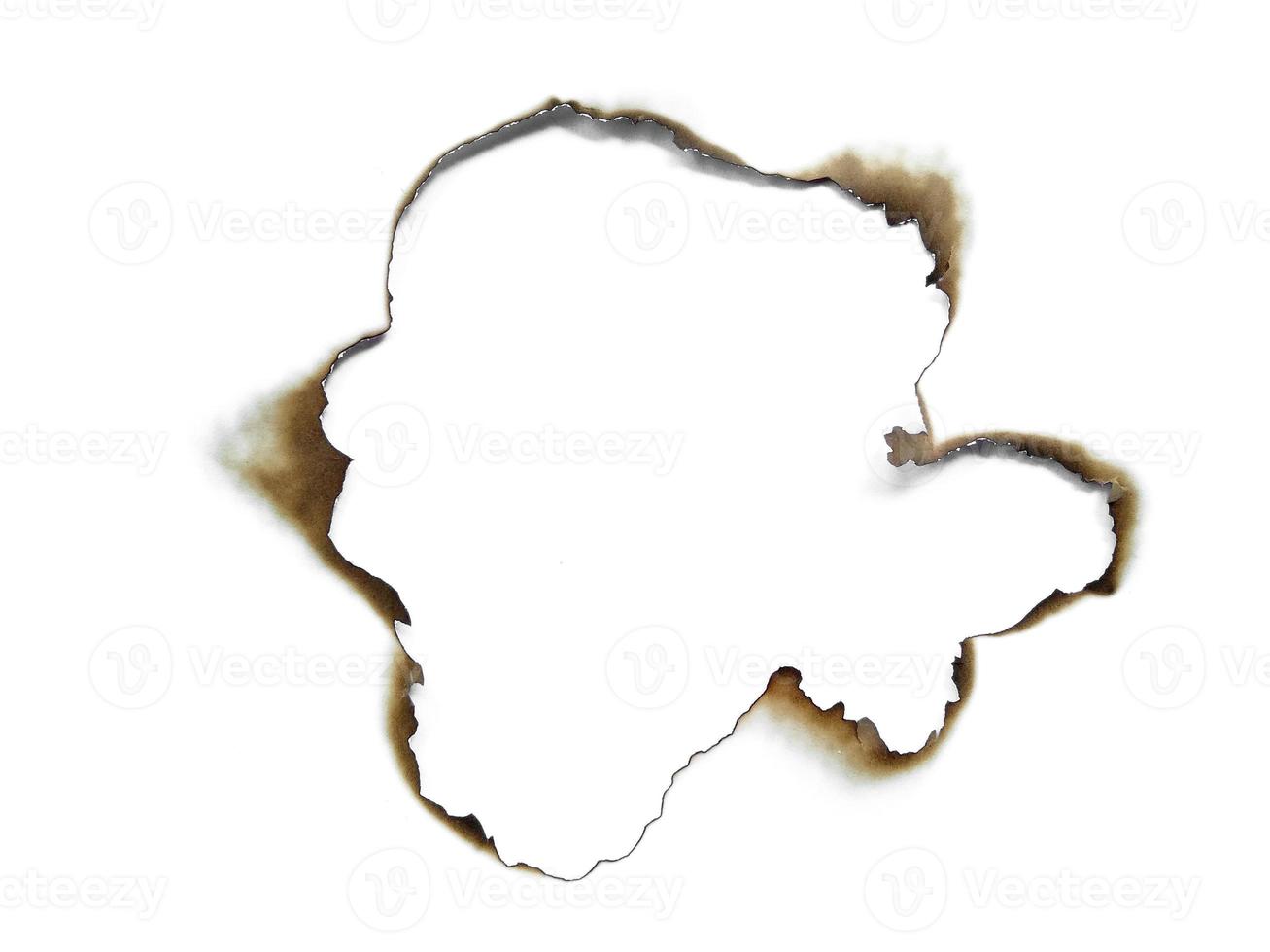 Paper burns on white backgrounds photo