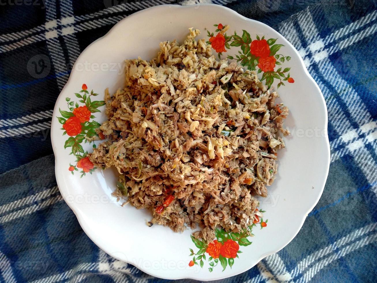 Lawar Khas Bali on a plate. Traditional Balinese Food photo