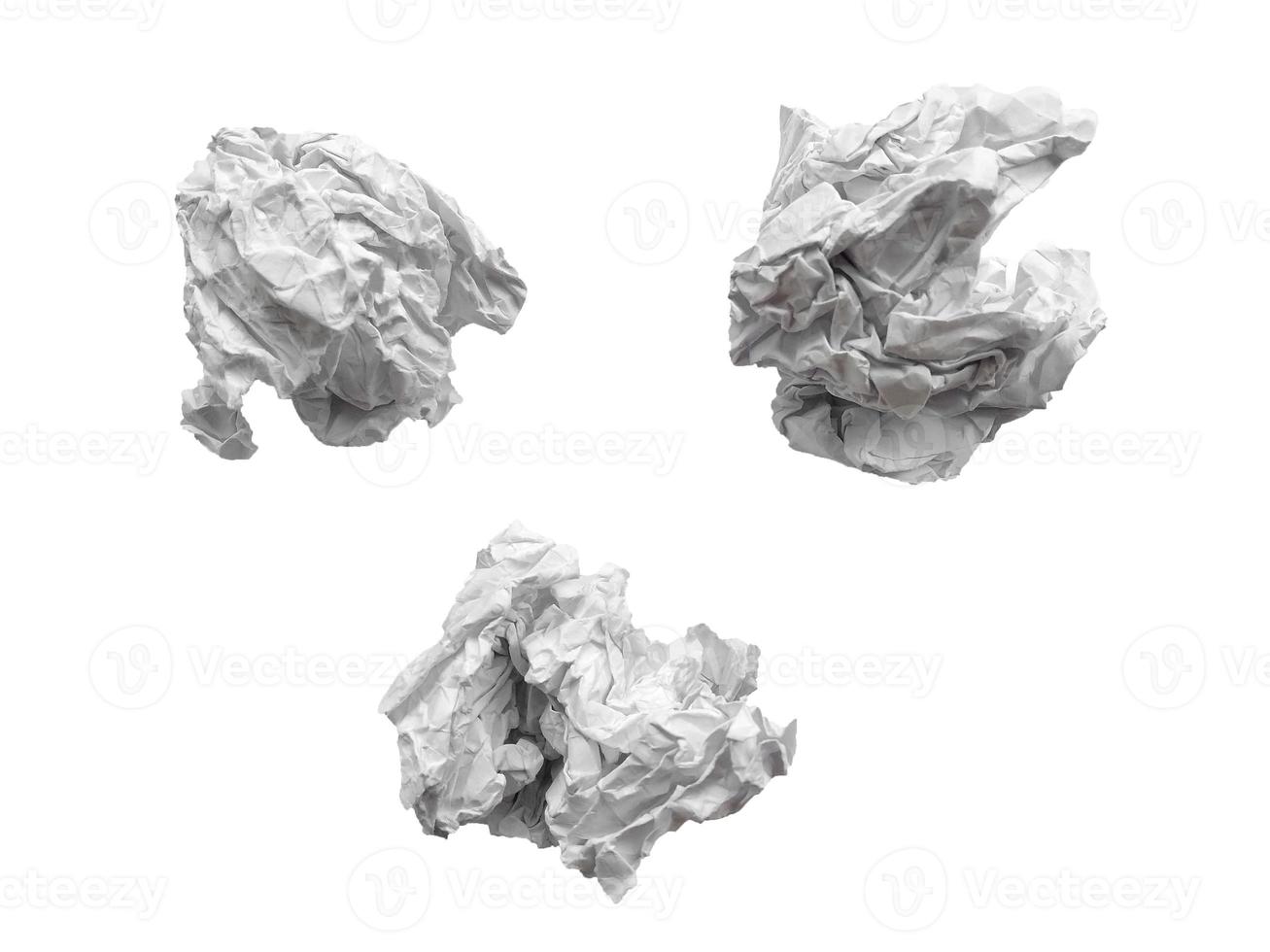 Crumpled paper ball isolated on white background photo