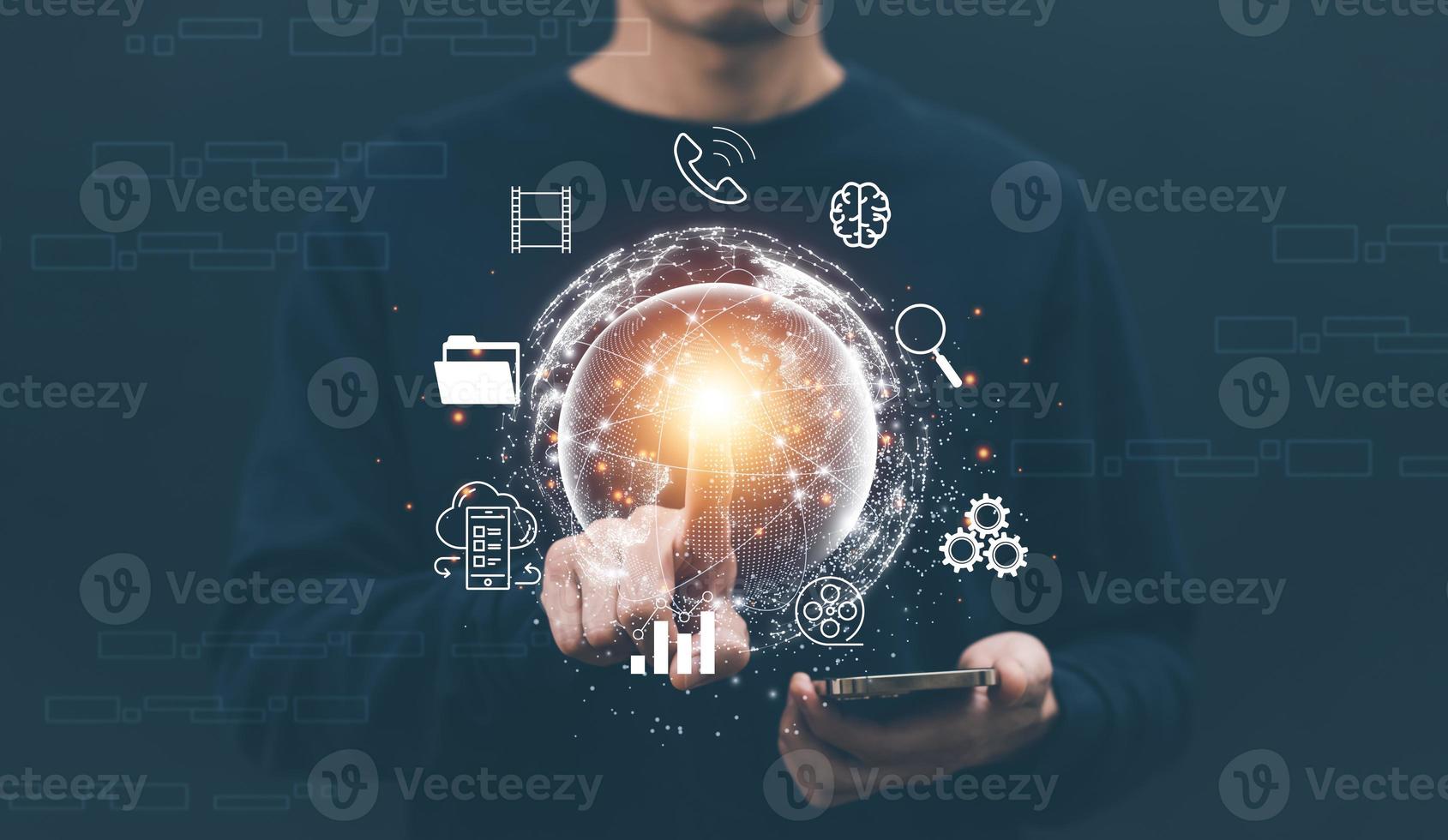 Metaverse with business concept, man using computer and touch virtual globe with financial icons future technology, business goals, online communication,graph Screen Icon of a media screen,big data photo