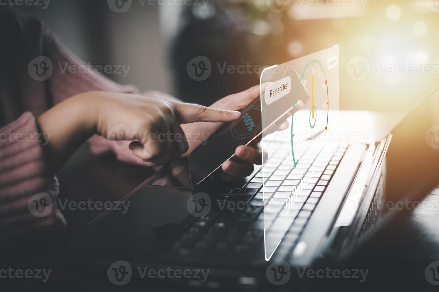 Fast internet connection with Metaverse technology concept, Hand holding smartphone and Virtual screen of Internet speed measurement,Internet and technology concept, 5G Hi speed internet concept photo