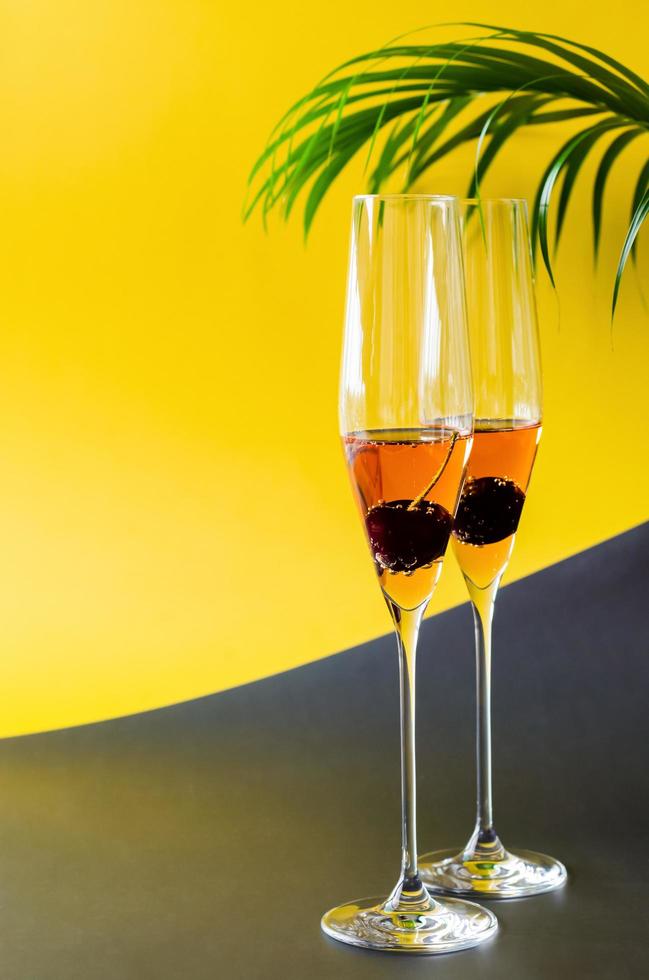 A glass of sparkling rose wine with cherry fruit 8286724 Stock Photo at