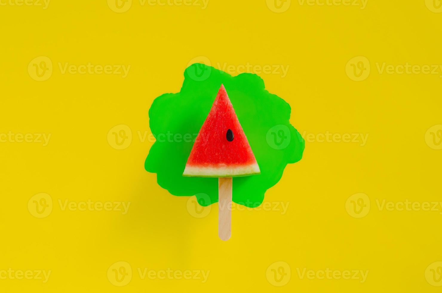 Red slice watermelon design as ice cream with stick photo