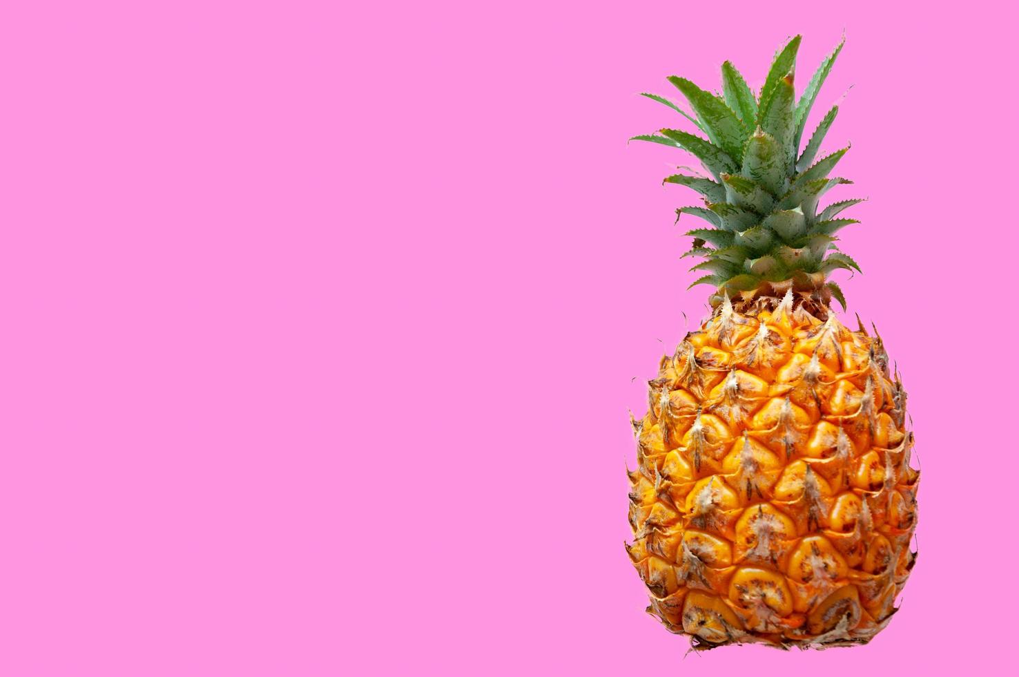 The fresh ripe pineapple with colorful backgorund for summer. photo