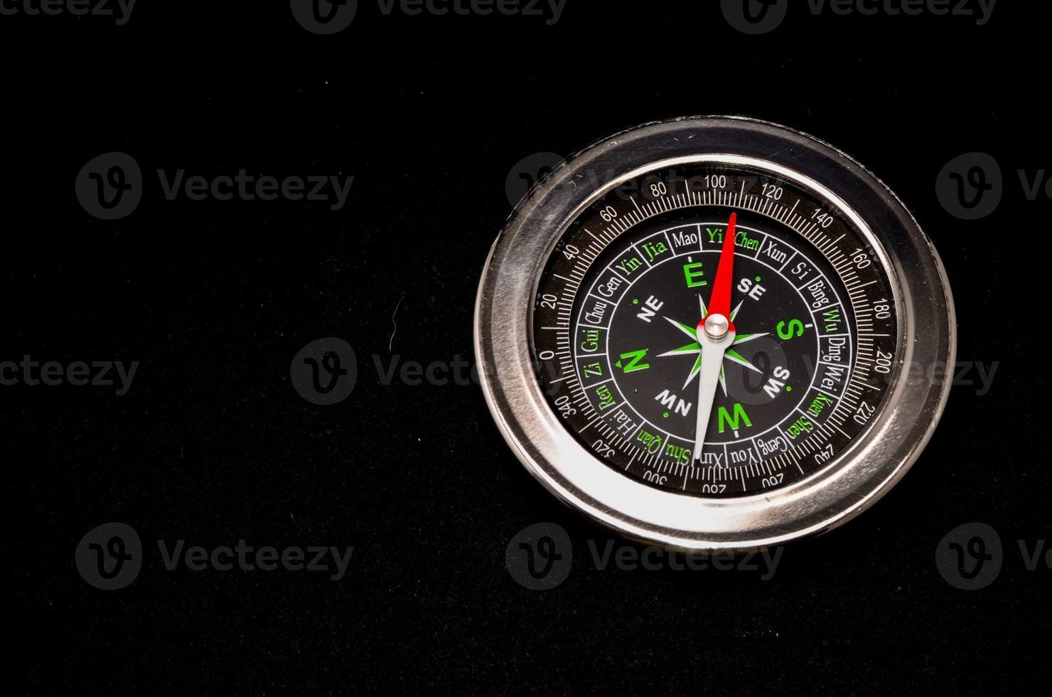 Vintage Compass on black photo