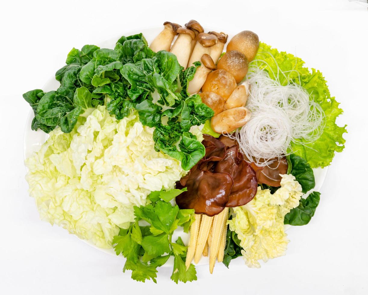 various fresh vegetables for sukiyaki on white background photo