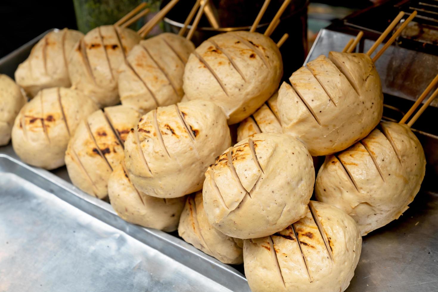 Meatballs barbecue with bamboo stick ,Thai style street food photo