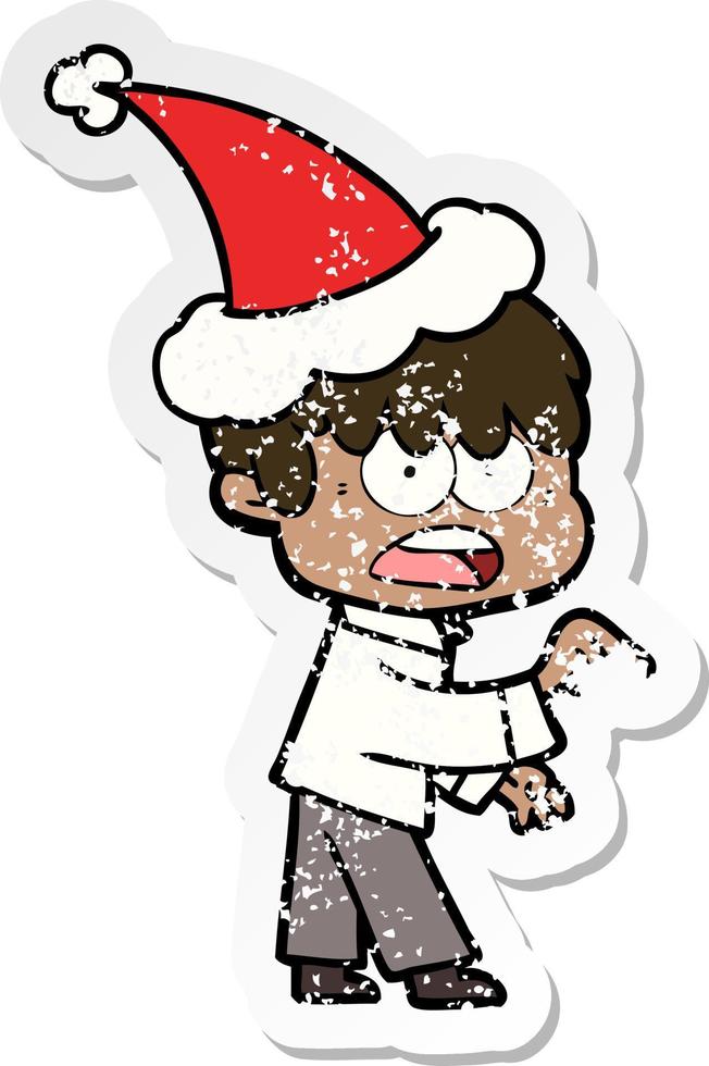 worried distressed sticker cartoon of a boy wearing santa hat vector