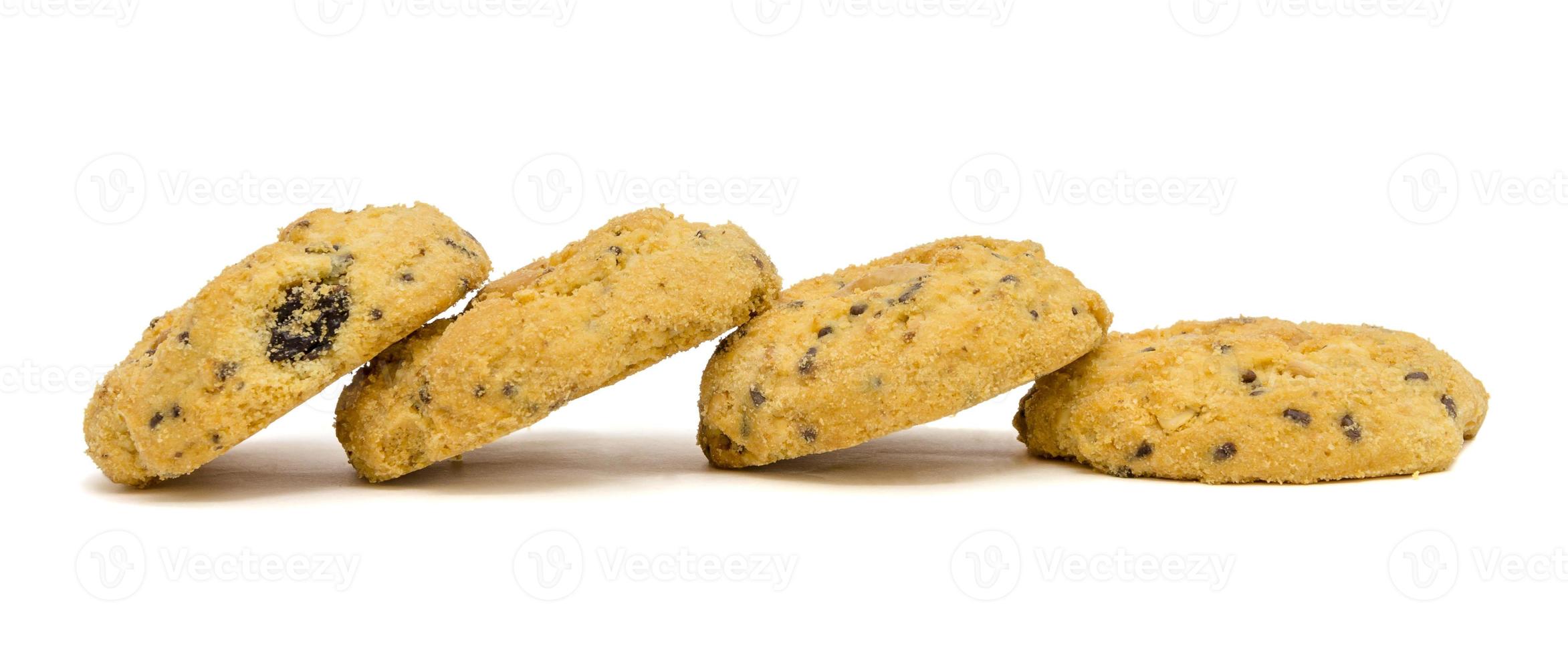 butter cookies with cashew nuts at eye level. isolated on white background photo