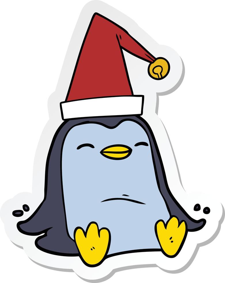 sticker of a cartoon penguin wearing christmas hat vector