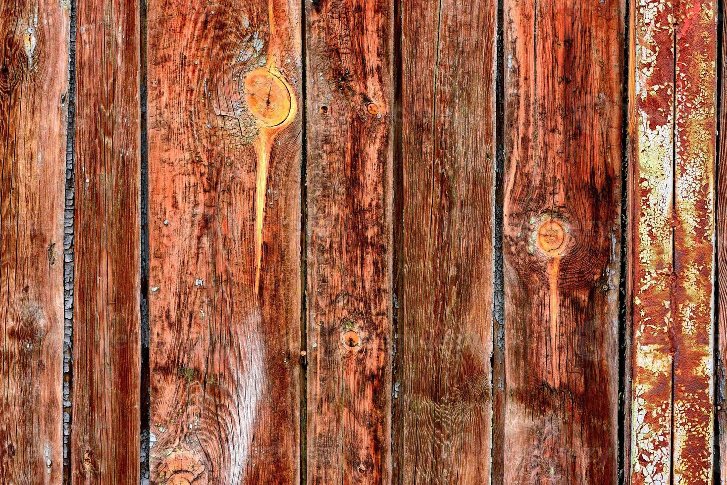 Wooden texture with scratches and cracks. It can be used as a background photo