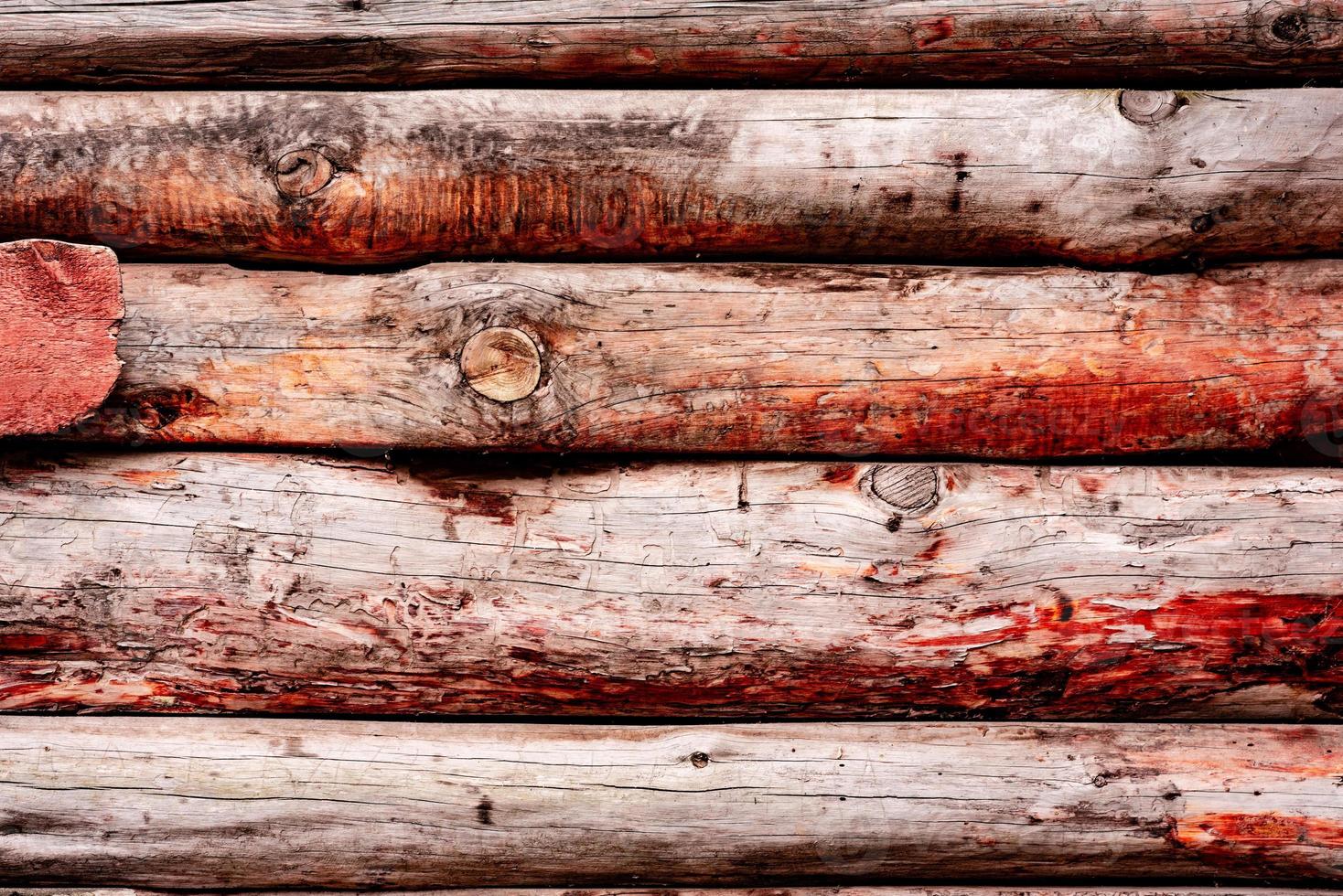 Wooden texture with scratches and cracks. It can be used as a background photo