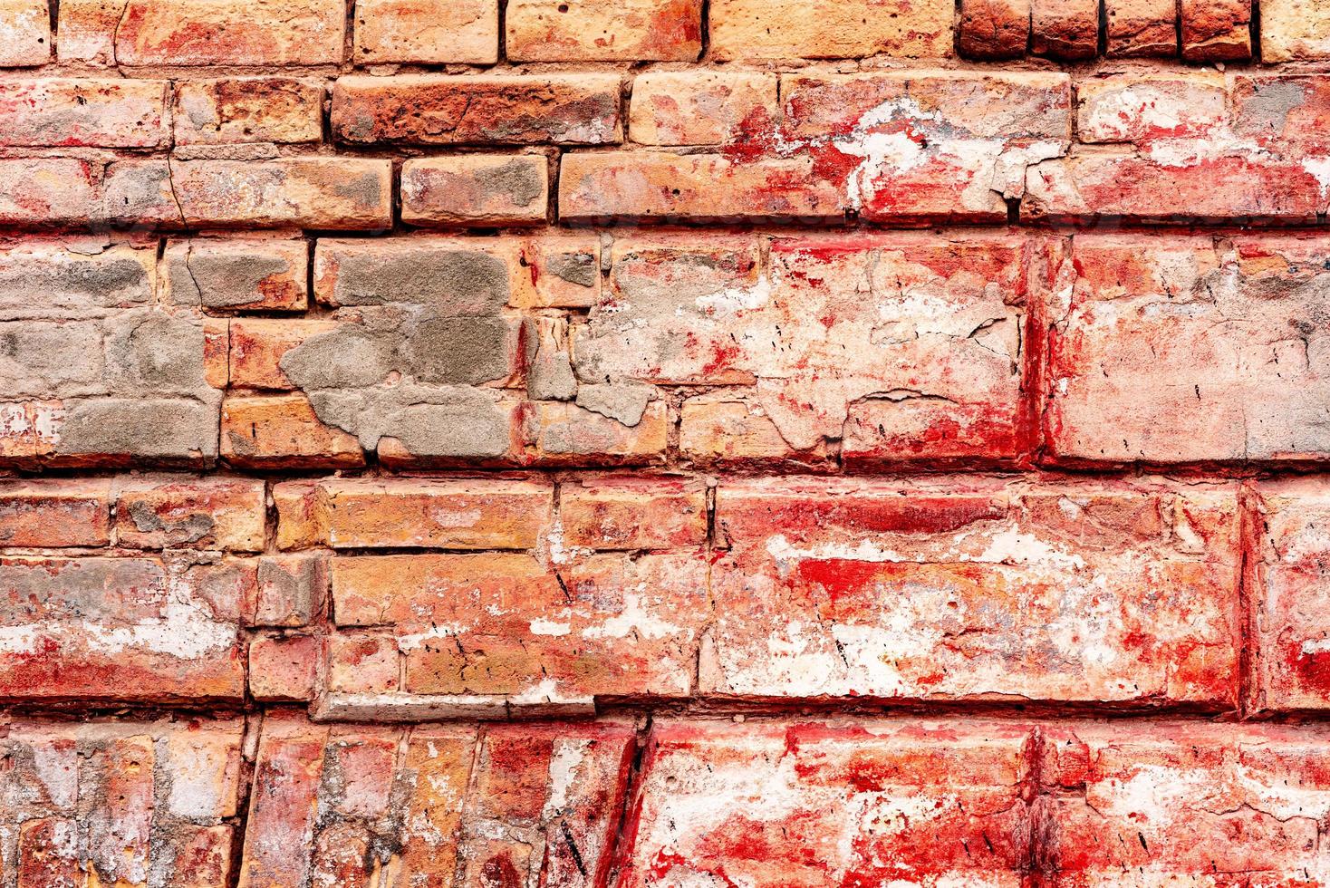 Texture, brick, wall, it can be used as a background. Brick texture with scratches and cracks photo