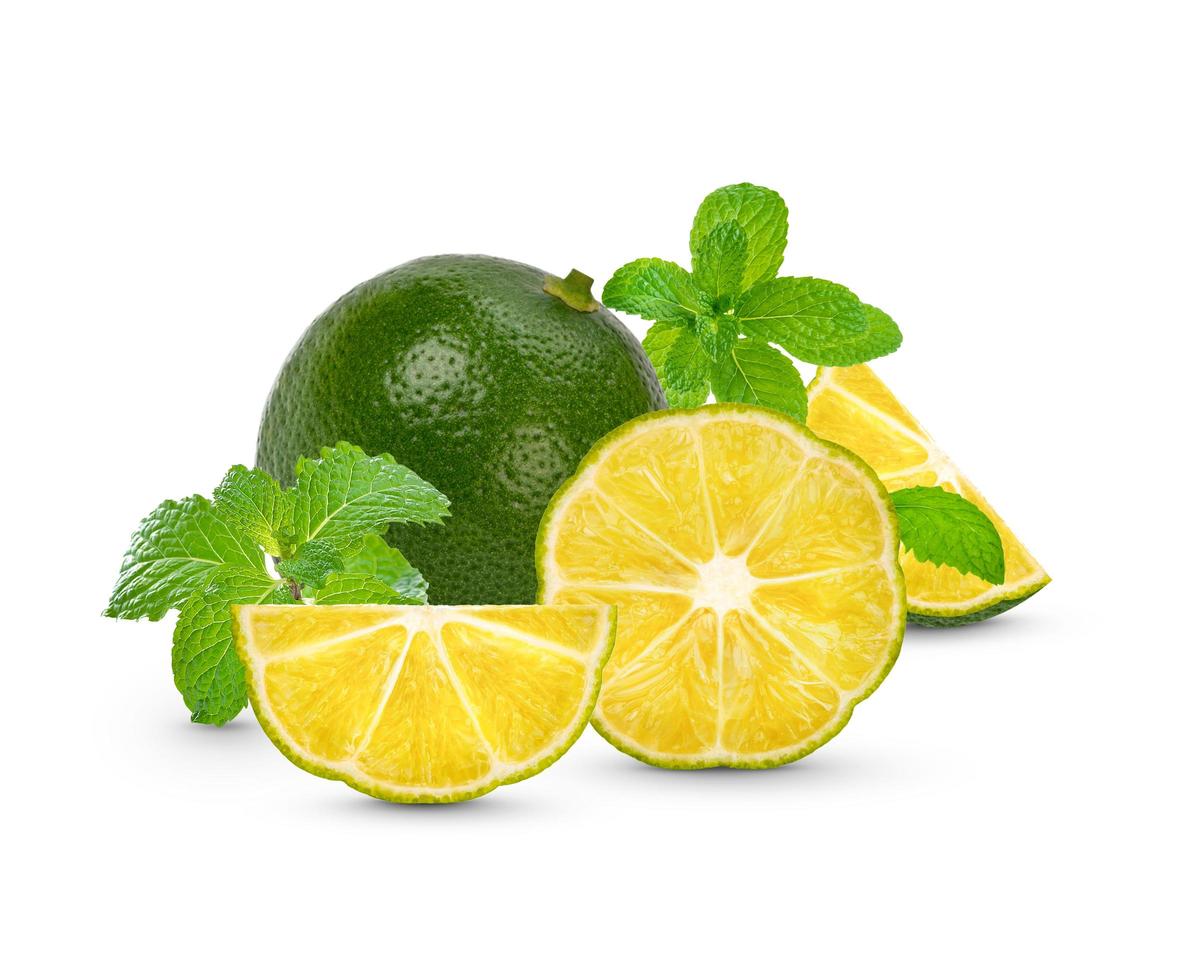 Fresh lime sliced with mint leaves isolated on white background photo