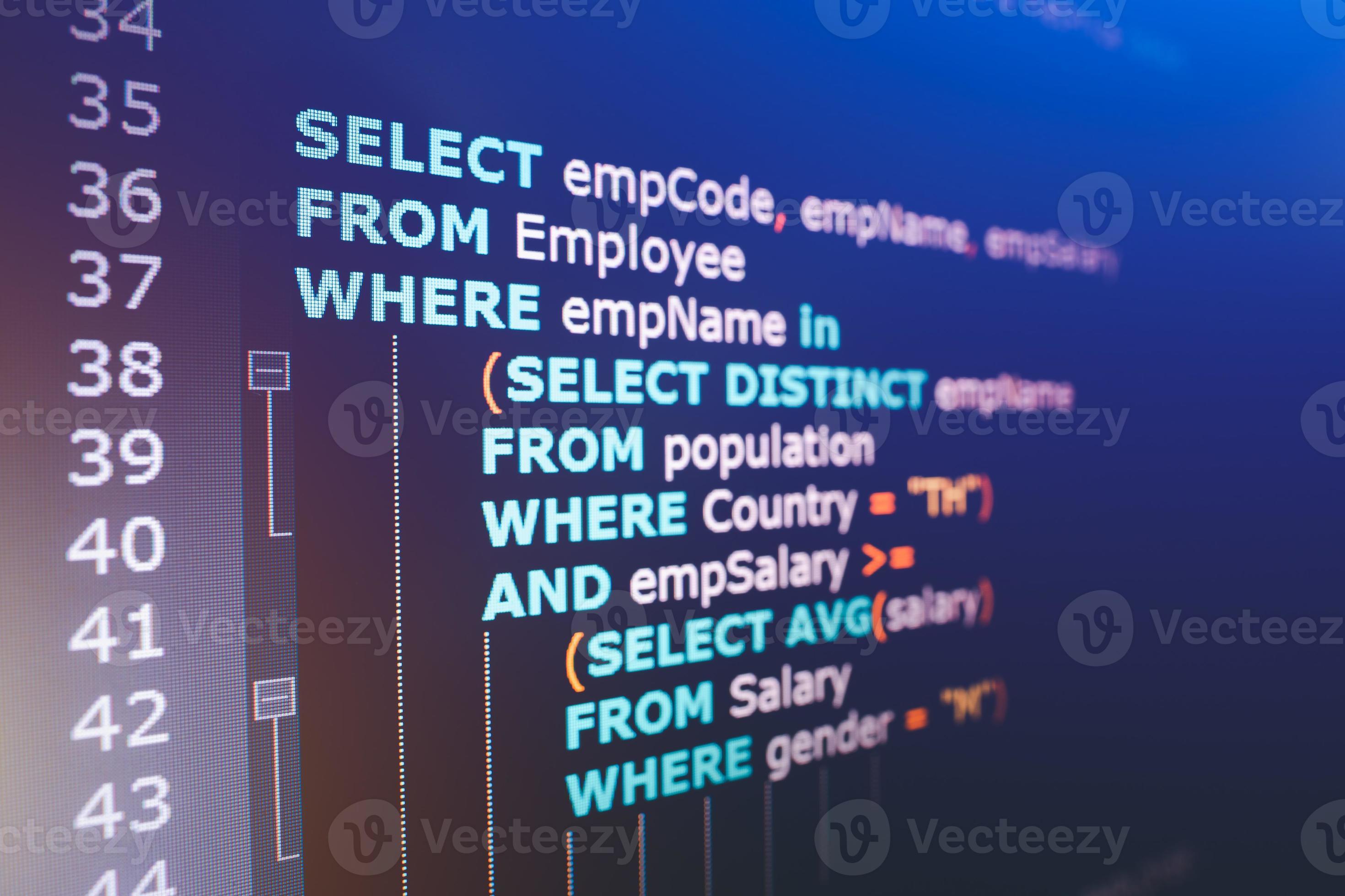 SQL or Structured Query Language code on computer monitor. Example of ...