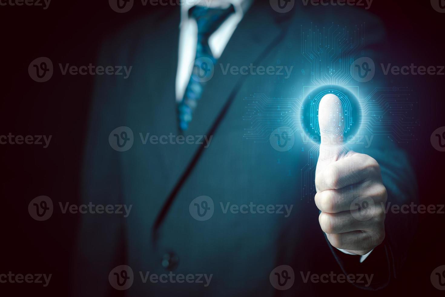 Businessman scans his fingerprint to access personal financial data. Futuristic business technology security concept. Innovation technology against digital cybercrime. Biometrics identity. photo
