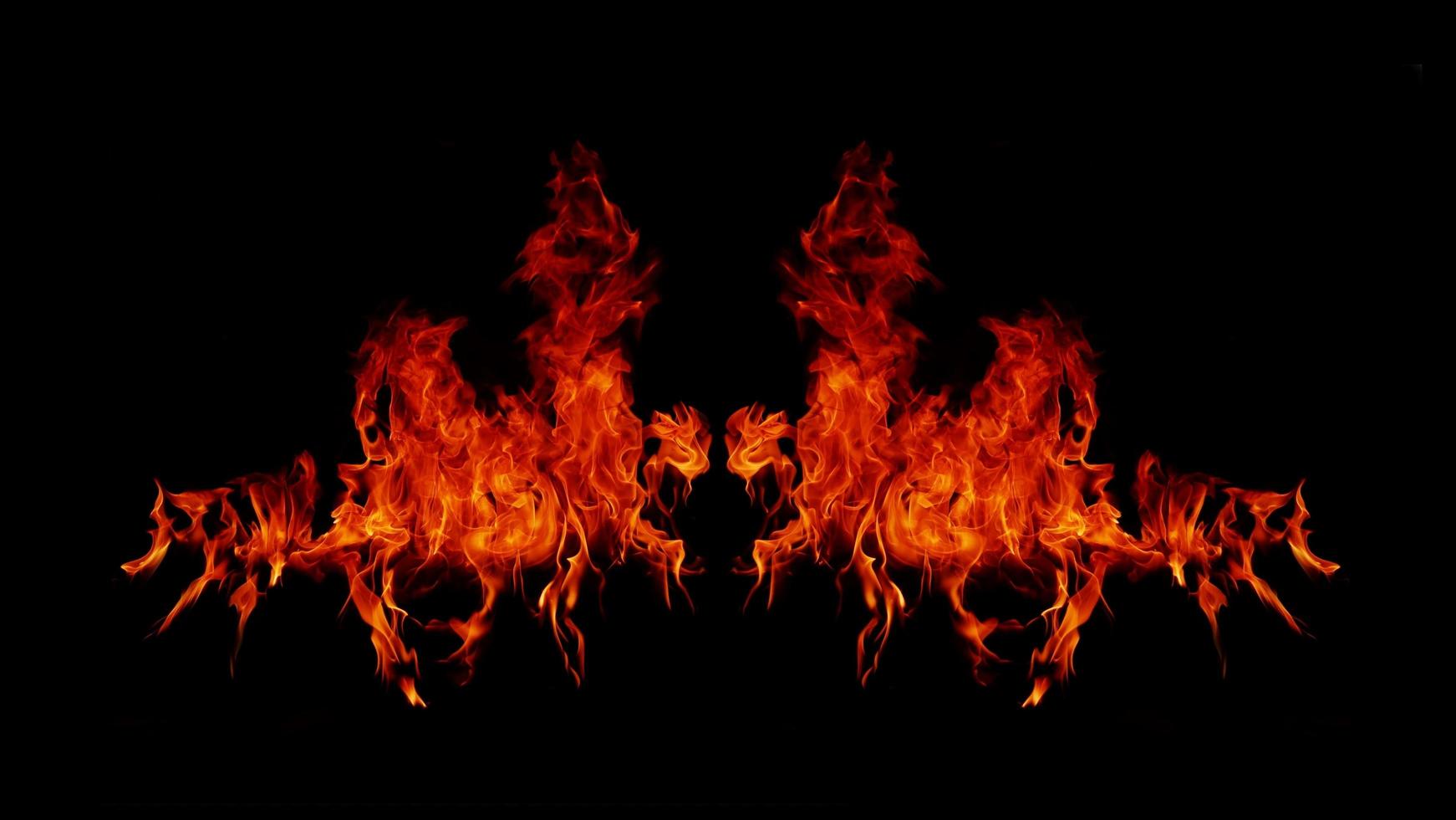 Flame Flame Texture For Strange Shape Fire Background Flame meat that is burned from the stove or from cooking. danger feeling abstract black background Suitable for banners or advertisements. photo