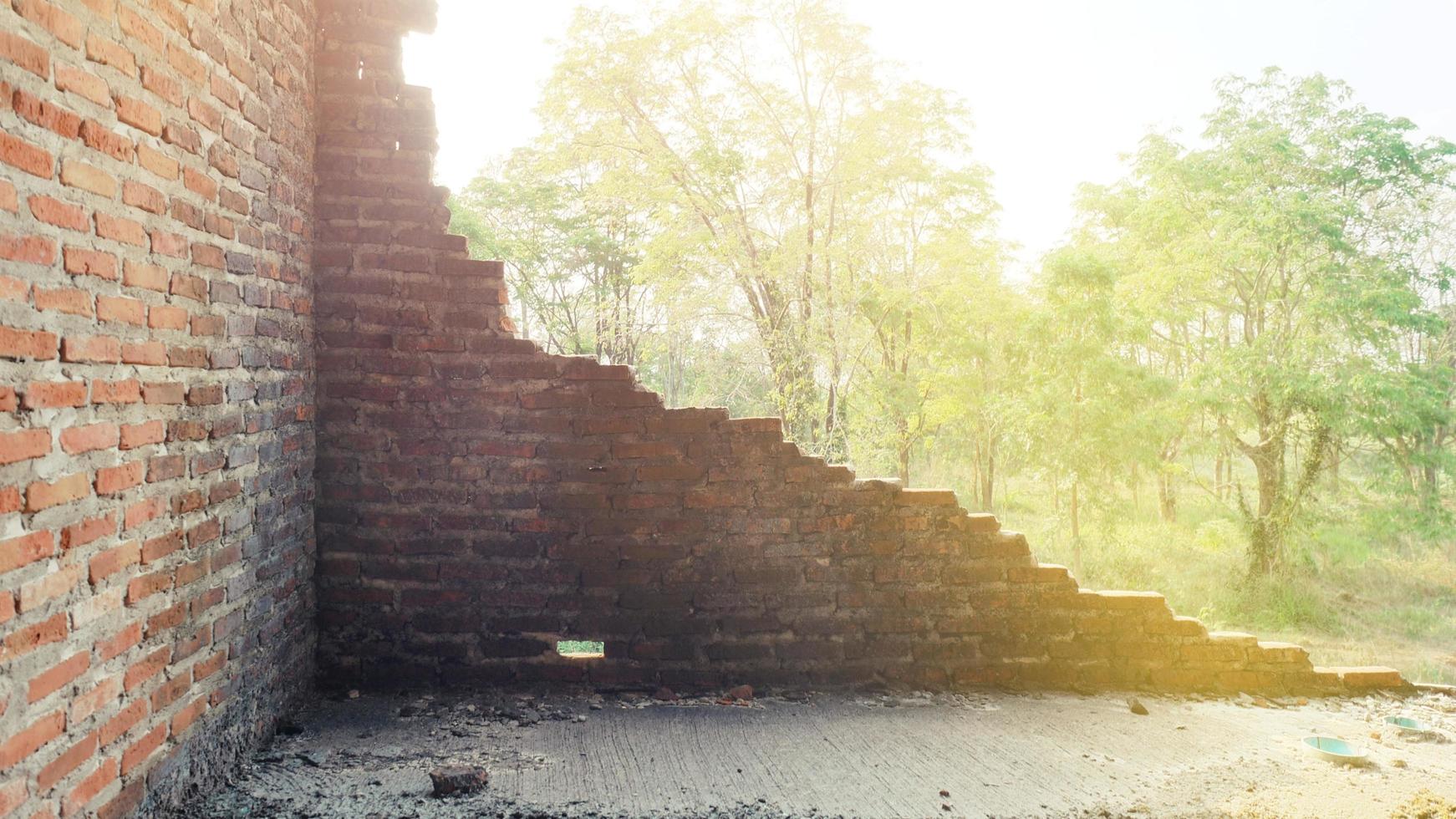 Close-up of the rubble of an industrial building collapsing into a pile of concrete and brick. and the jagged debris caused by the failure of the engineers at the abandoned construction. photo