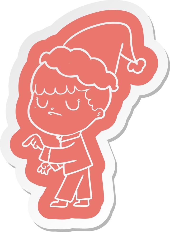 cartoon  sticker of a grumpy boy wearing santa hat vector