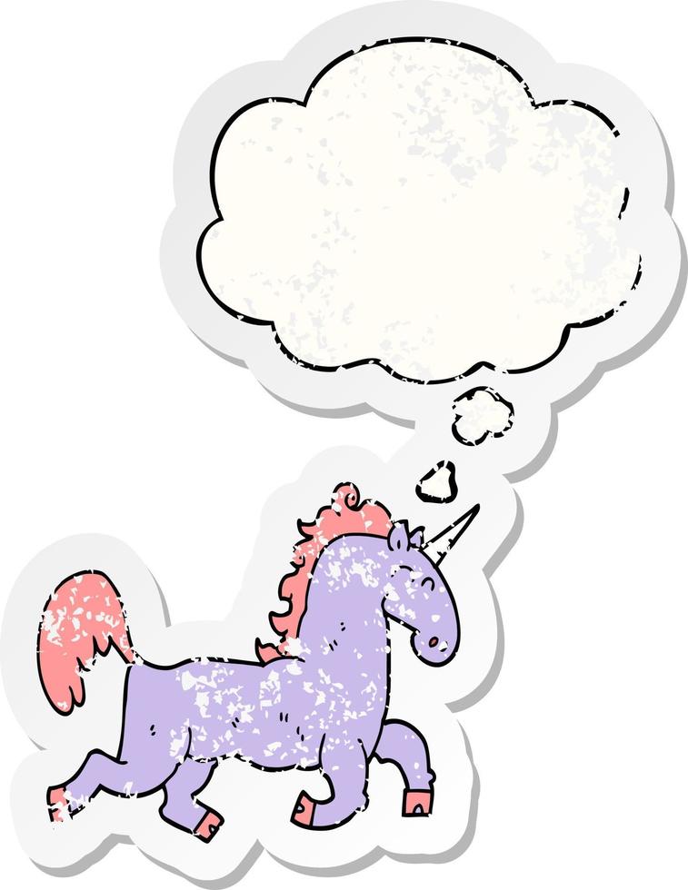 cartoon unicorn and thought bubble as a distressed worn sticker vector