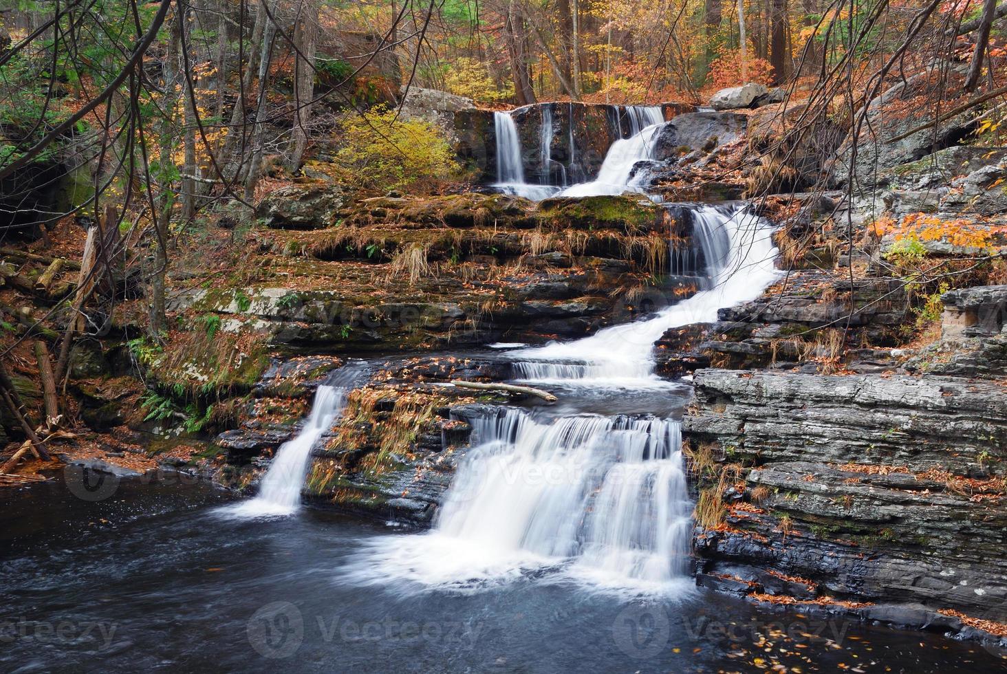 Autumn Waterfall in mountain photo