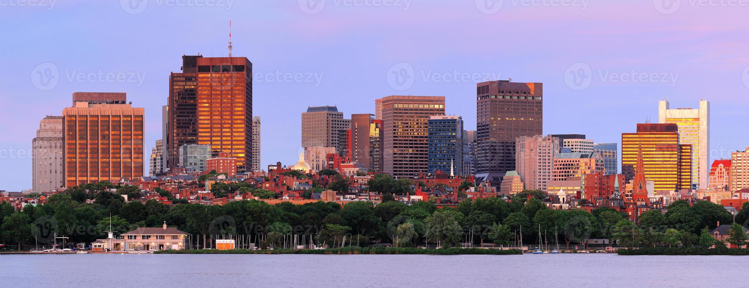 Urban skyscrapers over river photo