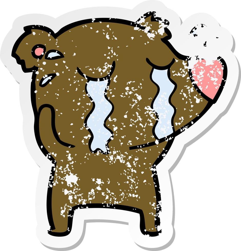 distressed sticker of a cartoon crying bear vector